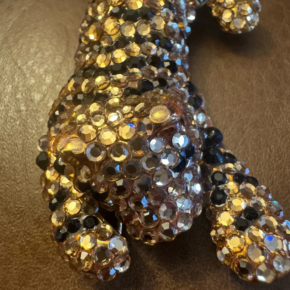 VTG gold tone articulated black & champagne rhinestone detailed tiger brooch